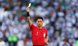 Fără echipă la Campionatul Mondial de Fotbal, China se mobilizează în spatele unui arbitru vedetă