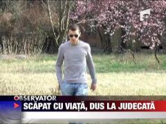 Scapat cu viata, dus la judecata