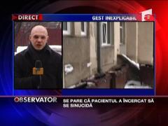 S-a aruncat pe geamul de la baie