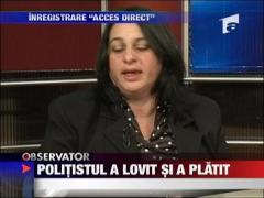 Politistul care a palmuit-o pe profesoara a fost sanctionat