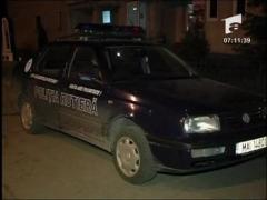 Politist beat la volan