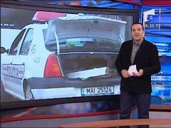 Masina de politie la lucru