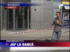 A jefuit o banca in toiul zilei