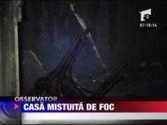 Casa mistuita de foc langa Braila