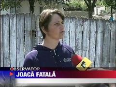 Joaca fatala! Copila sub gramada de lemne