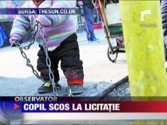 Copil scos la licitatie