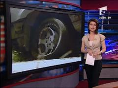 Si-a abandonat copiii in masina accidentata