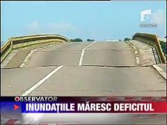 Inundatiile maresc deficitul