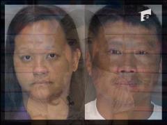 Copil tinut in lanturi