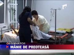 Preot, batut si taiat de preoteasa