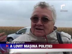 A lovit masina politiei