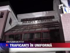 Traficanti in uniforma