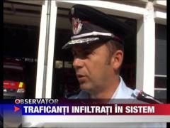 Traficanti infiltrati in sistem
