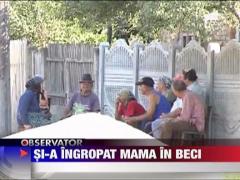 Si-a ingropat mama in beci
