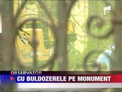 Cu buldozerele pe monument