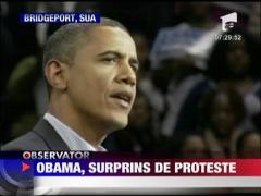 Obama, surprins de huduieli