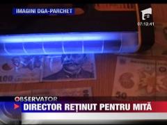 Director retinut pentru mita