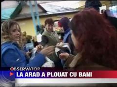 La Arad a plouat cu bani
