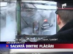 Salvata dintre flacari