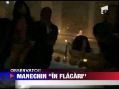 Manechin  in flacari in cada lui P. Diddy