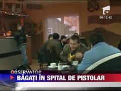 Bagati in spital de pistolar