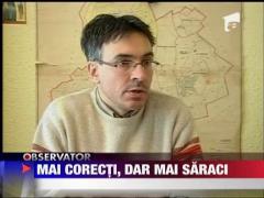 Romanii, mai corecti, dar mai saraci