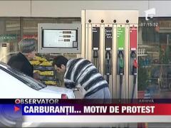 Soferii continua "protestul cu monede" la benzinarii