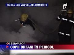 Copii salvati din foc de tatal adoptiv