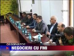 Guvernul incepe negocierile cu FMI