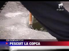 Pasionatii de pescuit la copca