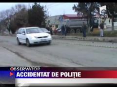 Copil de 11 ani  lovit in plin de o masina de politie