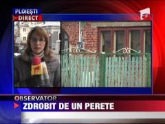 Tanar strivit de un perete din beton