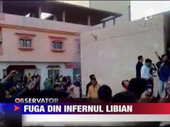 Romanii incearca sa fuga din infernul libian