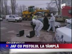 Jefuit in trafic, cu pistolul la tampla