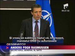 Liderii NATO il avertizeaza pe Gaddafi