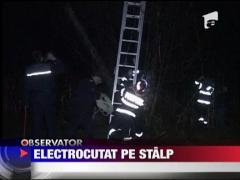 Un tanar de 20 de ani a stat atarnat de un stalp de tensiune mai bine de opt ore