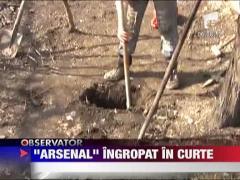 A gasit o punga cu 80 de cartuse ingropata in curte