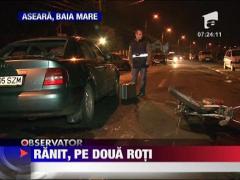 A intrat cu scuterul intr-o masina