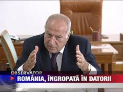 Romania, ingropata in datorii