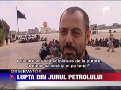 Luptele dintre rebeli si fortele lui Gaddafi se concentreaza in jurul petrolului