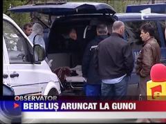 Bebelus aruncat la gunoi