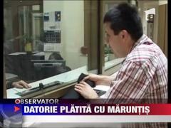 Datorie platita cu maruntis