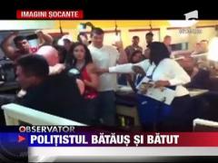 Un politist a lovit cu pumnul o femeie