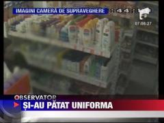 Politisti, hoti din supermarket