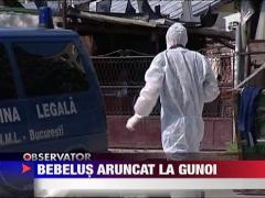 Bebelus aruncat la gunoi