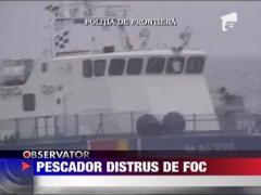 Pescador distrus de foc