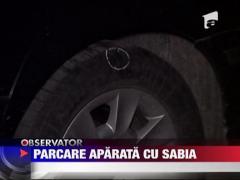 Loc de parcare aparat cu sabia si cu pistolul