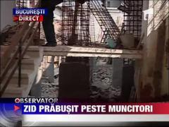 Zid prabusit peste muncitori in Capitala