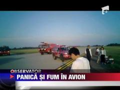 Panica si fum in avion