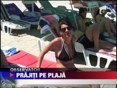 Mii de oameni prajiti pe plaje